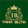 Taha Boutique mağazasının Alanya caddesindeki modern vitrin görüntüsü, kadın ve erkek şık giyim ürünleriyle dolu.