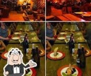 Şırahmene Wine House’un Mahmutlar Barbaros Caddesi üzerindeki açık/küçük iç mekânı; raflarda sergilenen şarap şişeleri ve önlerinde bir-iki masada keyifle sohbet eden müşteriler yer alıyor. Alanya