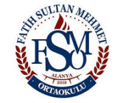 Alanya Fatih Sultan Mehmet Ortaokulu binası, modern eğitim olanakları ve öğrencilere güvenli, destekleyici öğrenme ortamı sunan ortaokul.