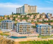 Alanya Gayrimenkul Yatırım Ortaklığı’nın modern konut projeleri ve yatırım fırsatlarını yansıtan görsel