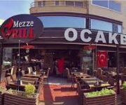 Bizbize Ocakbaşı Alanya’da mangalda pişen kebaplar ve sıcak aile ortamı.