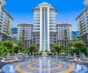 Modern Group ofisi ve danışmanları, Mahmutlar, Alanya’da satılık ve kiralık daire, villa ve yatırım amaçlı gayrimenkul hizmeti sunarken.