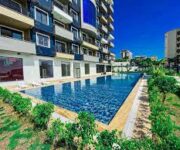 New Home Real Estate ofisi ve danışmanları, Alanya’da satılık ve kiralık konut ile yatırım amaçlı gayrimenkul hizmeti sunarken.