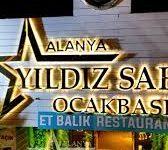 “Alanya Yıldız Sahil Ocakbaşı Restaurant’ta deniz manzarası eşliğinde kebap, ızgara ve meze çeşitleri”