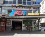 “ADT Auto Garage, araç bakım ve onarım hizmetleri sunan modern oto servis alanı.”