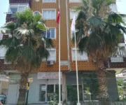 “Alanya 6 Nolu Aile Sağlığı Merkezi modern muayene odaları ve sağlık hizmet alanı.”