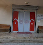 “Cumhuriyet Aile Sağlığı Merkezi modern muayene odaları ve sağlık hizmet alanı.”