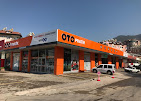 “Otopratik Hanedar Alanya oto bakım ve tamir servisi alanı ve araçları.”