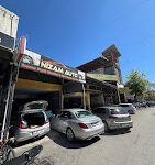 Nizam Auto servisinde boyasız göçük düzeltme ve mini onarım işlemleri yapılırken çekilmiş görüntü