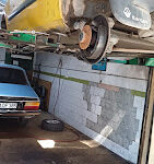 “Alanya Yılmaz Oto Tamir servisinin araç bakım ve onarım hizmeti sunan modern atölyesi.”