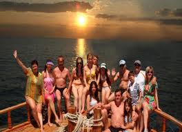 Alanya boat tour on the Mediterranean Sea with guests enjoying fun activities and breathtaking sunset views in 2026