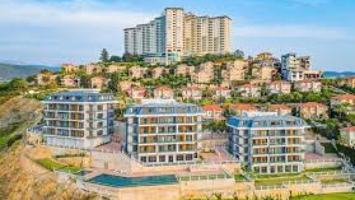 Alanya Gayrimenkul Yatırım Ortaklığı’nın modern konut projeleri ve yatırım fırsatlarını yansıtan görsel