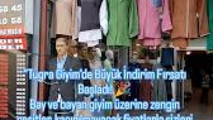 Tuğra Giyim Alanya – Kadın ve erkek giyiminde kaliteli, şık ve modern tasarımların yer aldığı mağaza vitrini.
