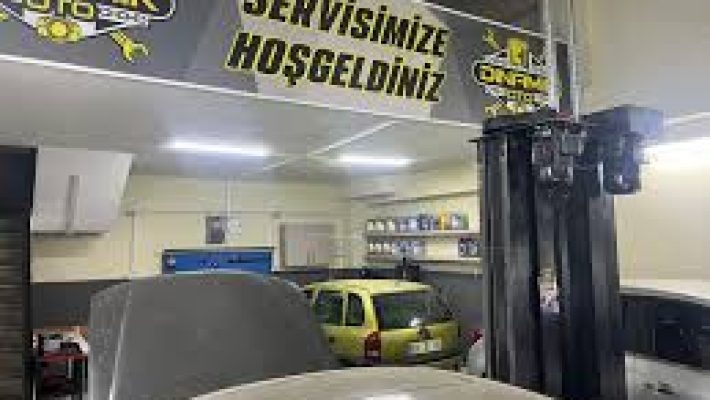 “Dinamik Oto Özel Ford Servisi’nde araç bakım ve onarım işlemleri ile çekici hizmetinin sunulduğu modern servis alanı.”