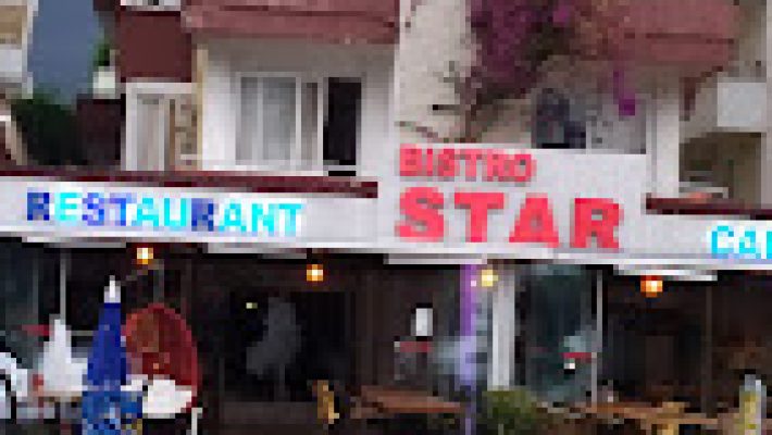 Bistro Star Restaurant Cafe ve Bar’da şık ortamda sunulan lezzetli yemekler ve içecekler.
