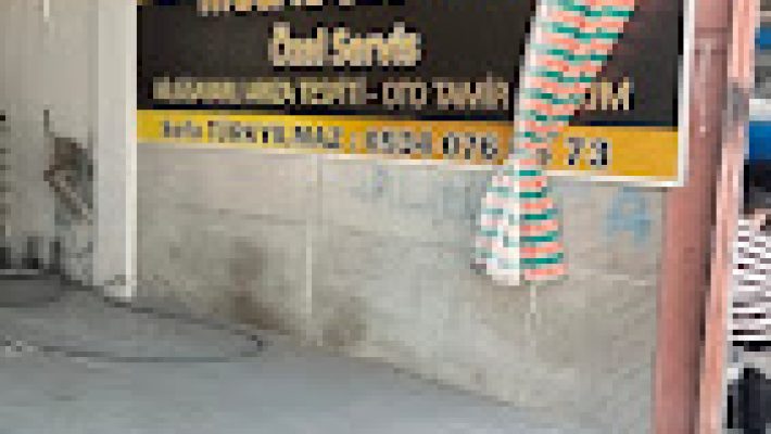 “Musaoğlu Tamir Bakım Servisi servis alanında araçların bakım ve onarım işleminin yapıldığı modern oto servis görüntüsü.”