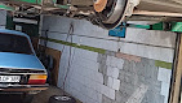 “Alanya Yılmaz Oto Tamir servisinin araç bakım ve onarım hizmeti sunan modern atölyesi.”